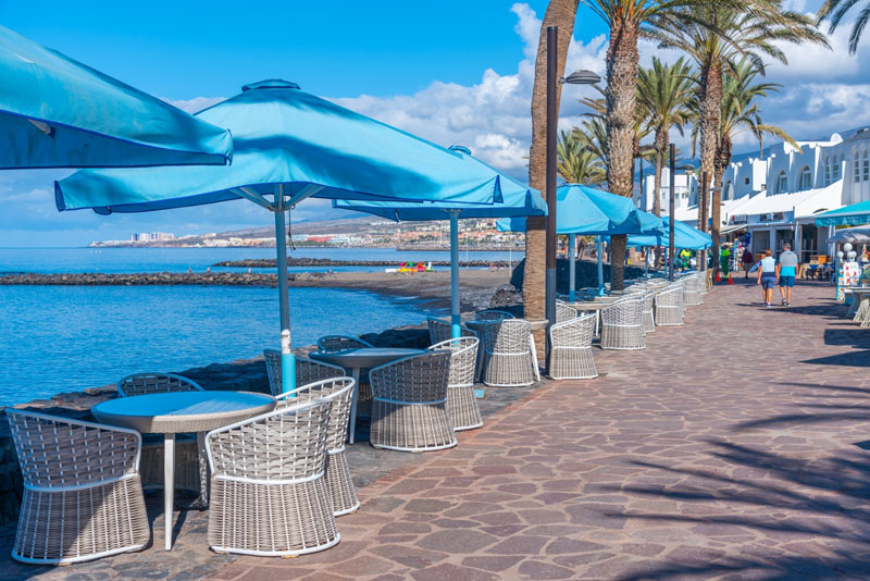 Seaside promenade at Playa de las Americas, Tenerife, Canary Islands, Spain.